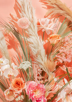 粉色花卉與干枯蒲葦花束
