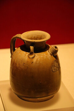 黃釉雙系執(zhí)壺