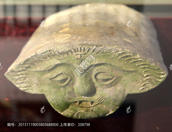 明,人面紋瓦當(dāng)