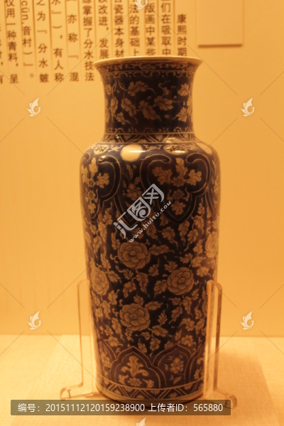青花拔白花卉紋筒式瓶