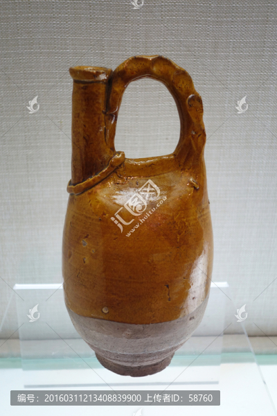 黃釉提梁雞冠壺