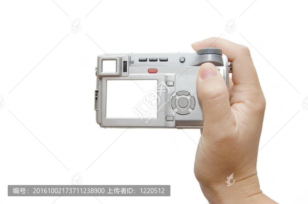用緊湊型數(shù)碼相機(jī)拍照的女性手