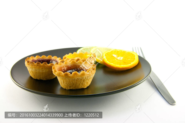 果醬餡餅和柑橘片和Fork