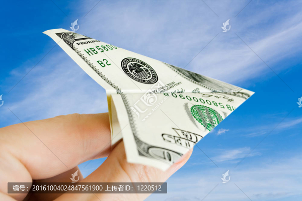 金錢飛機(jī)在手指