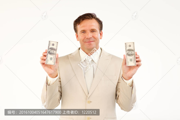 英俊的商人拿著錢