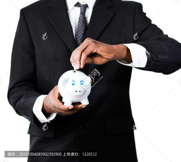 一個(gè)商人在存錢罐里存錢