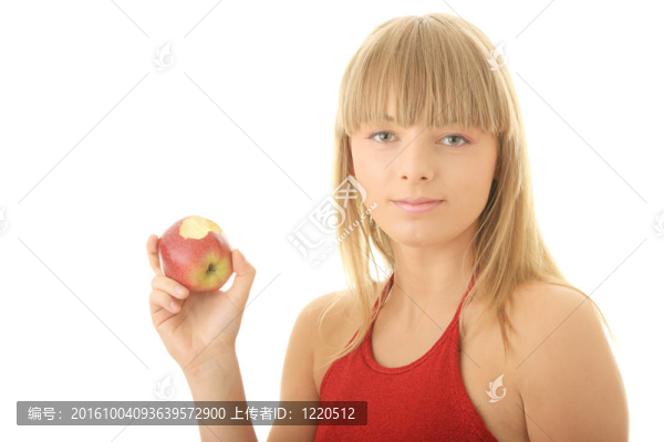 年輕的金發(fā)女人，紅蘋果