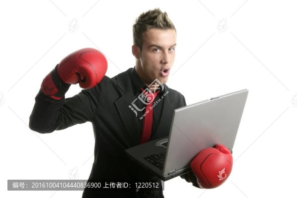 拳擊年輕商人與筆記本電腦