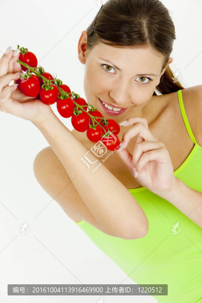 婦女拿著西紅柿的肖像