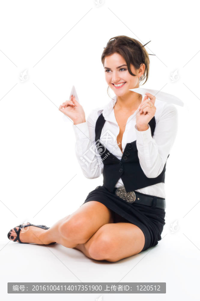 快樂的女人玩紙飛機(jī)