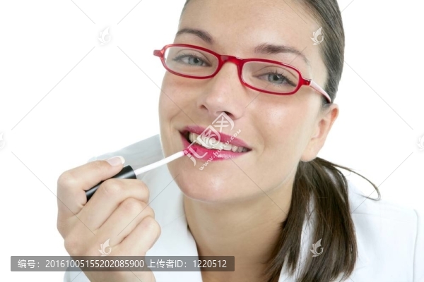 漂亮的女商人組成的紅色唇膏