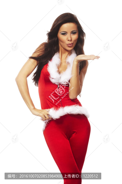 美麗的黑發(fā)女人穿著性感的圣誕老人的衣服