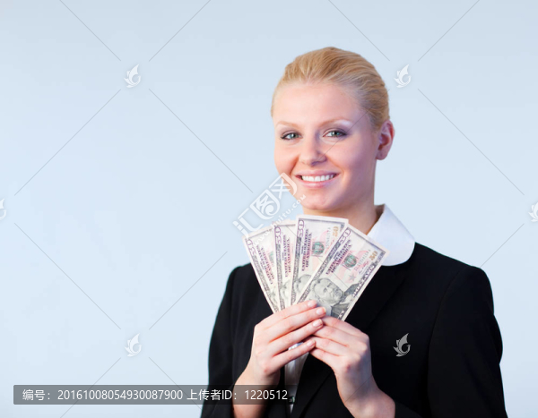 商業(yè)女人拿著錢