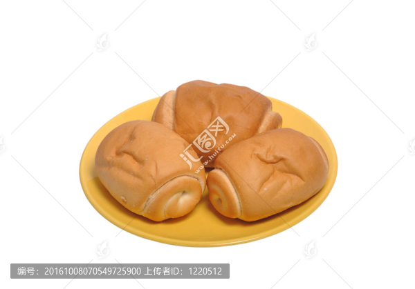 在白色的盤子上的小面包