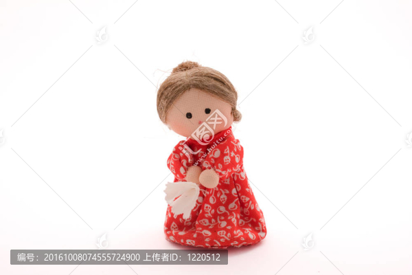 穿著紅色衣服的可愛的布