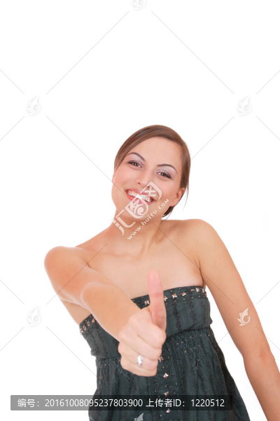 美麗的年輕女子豎起大拇指的跡象