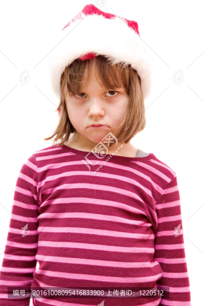 小女孩打扮得像圣誕老人