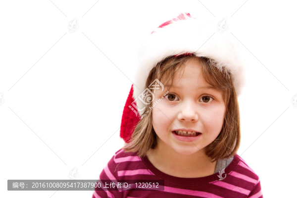 小女孩打扮得像圣誕老人
