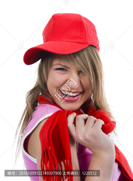 美麗的年輕女人在紅帽子
