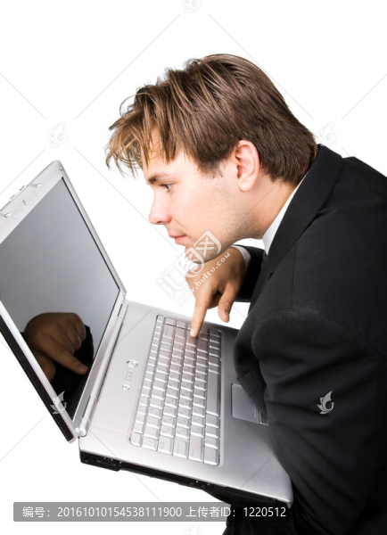 年輕的商人與筆記本電腦