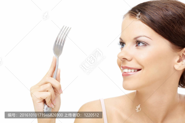 用叉子的女人