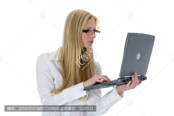 商務(wù)女人和筆記本電腦