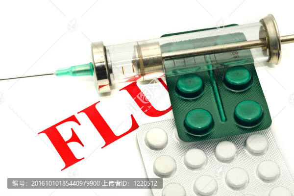 疾病警報-藥丸和注射器在白色
