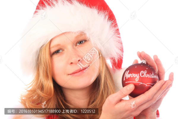 Santa小姐捧著一棵紅色圣誕樹球