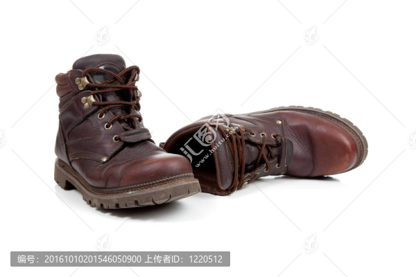 一雙棕色的白色皮革登山靴