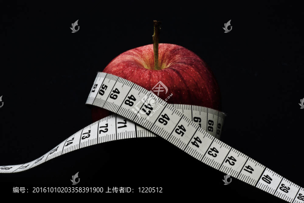 帶測量帶的紅蘋果