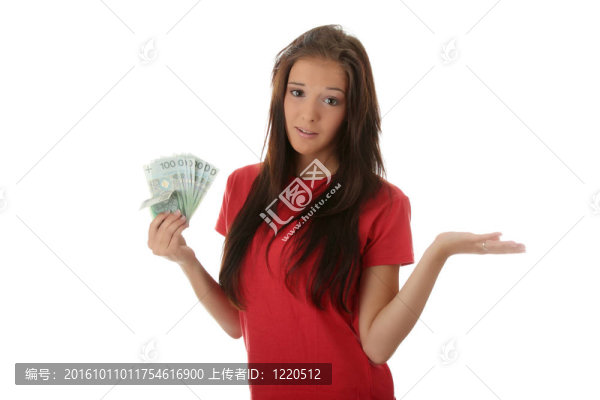 年輕女士拿著現(xiàn)金