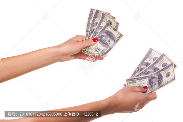 女人手和美元