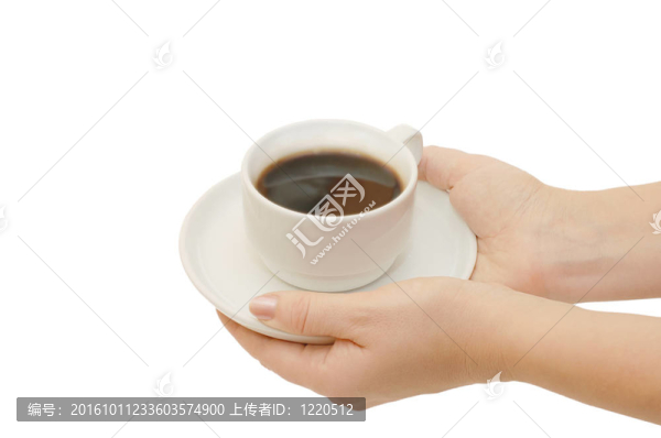 咖啡杯在白色的手上