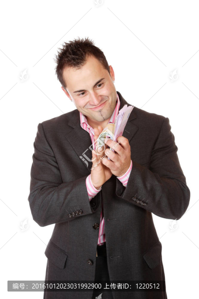 一個商人持有金錢的肖像