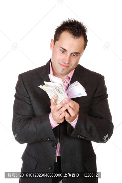 一個商人持有金錢的肖像