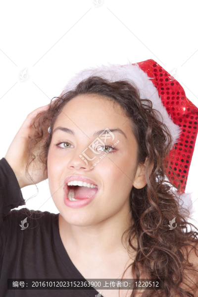 戴圣誕帽的年輕女子