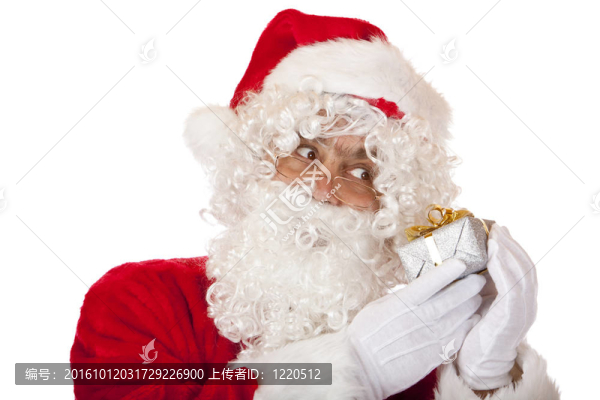 老圣誕老人正在聽圣誕禮物。