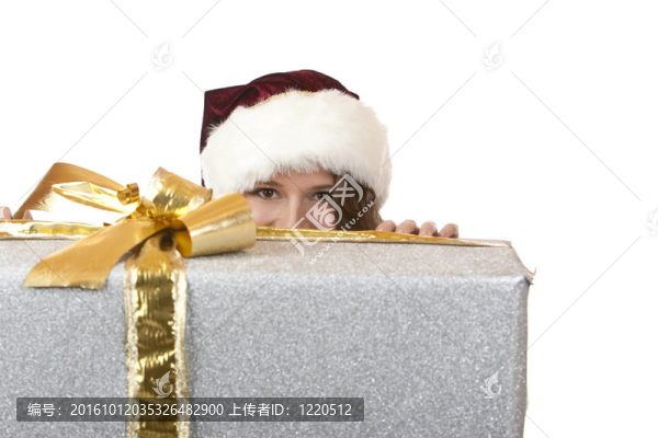 Santa,Claus,Woman藏在圣誕禮物后面