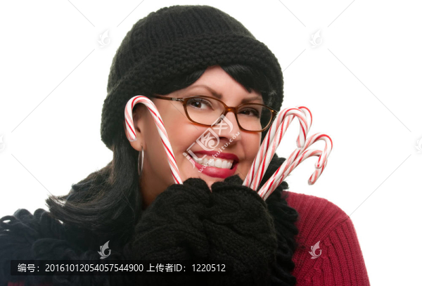 漂亮的女人拿著棒棒糖