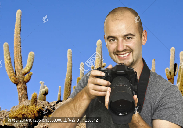 攝影師和仙人掌背景