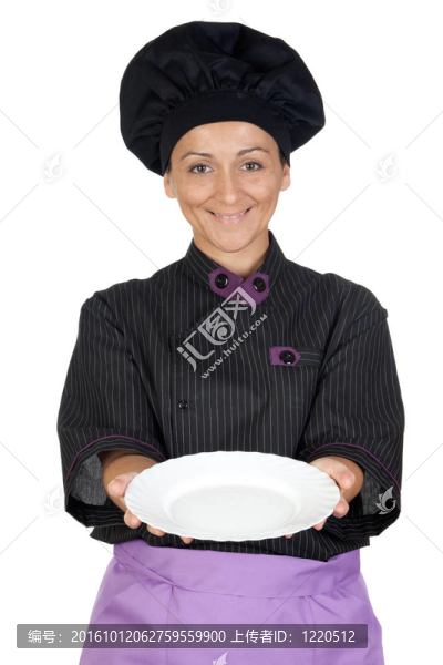 漂亮的廚師女人用黑色的制服