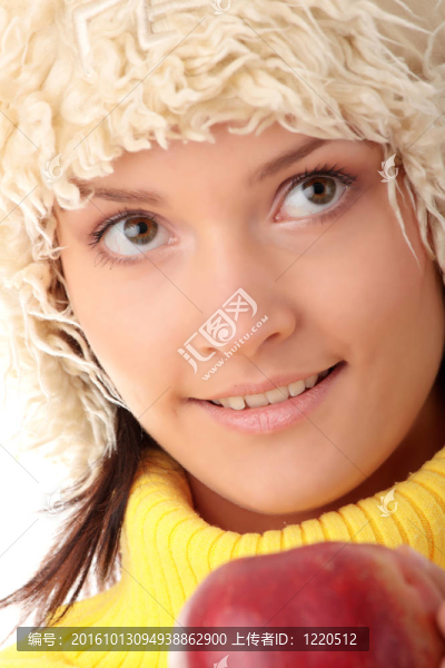 年輕的紅蘋(píng)果的女人