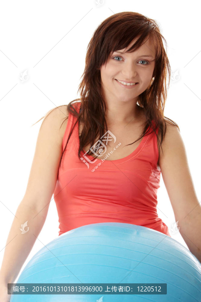 年輕快樂女子做健身運(yùn)動(dòng)