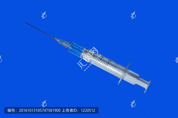 藍色背景上的注射器