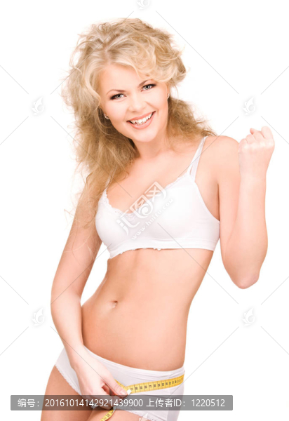 帶測量帶的年輕漂亮女人