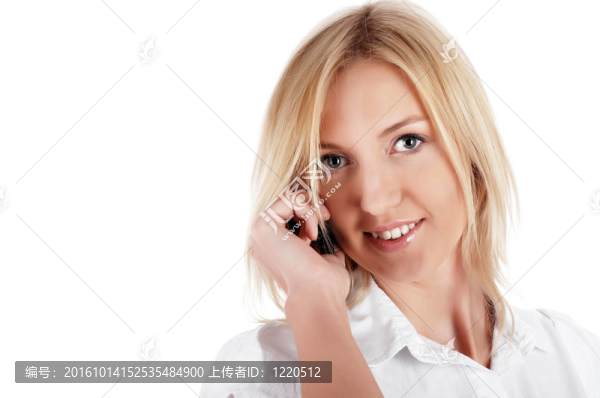 電話在一個(gè)白襯衫迷人的金發(fā)女商人