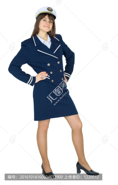 年輕漂亮的女人穿著制服站在白色背景下