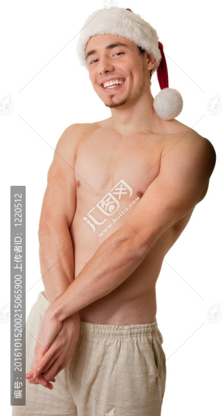 赤裸軀干和Santa帽的運動員