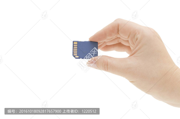 閃存卡在手上孤立的白色
