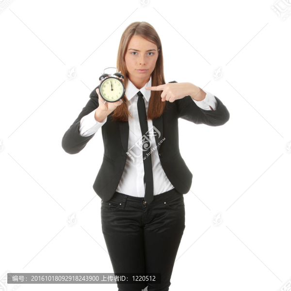 一個帶鬧鐘的年輕女人